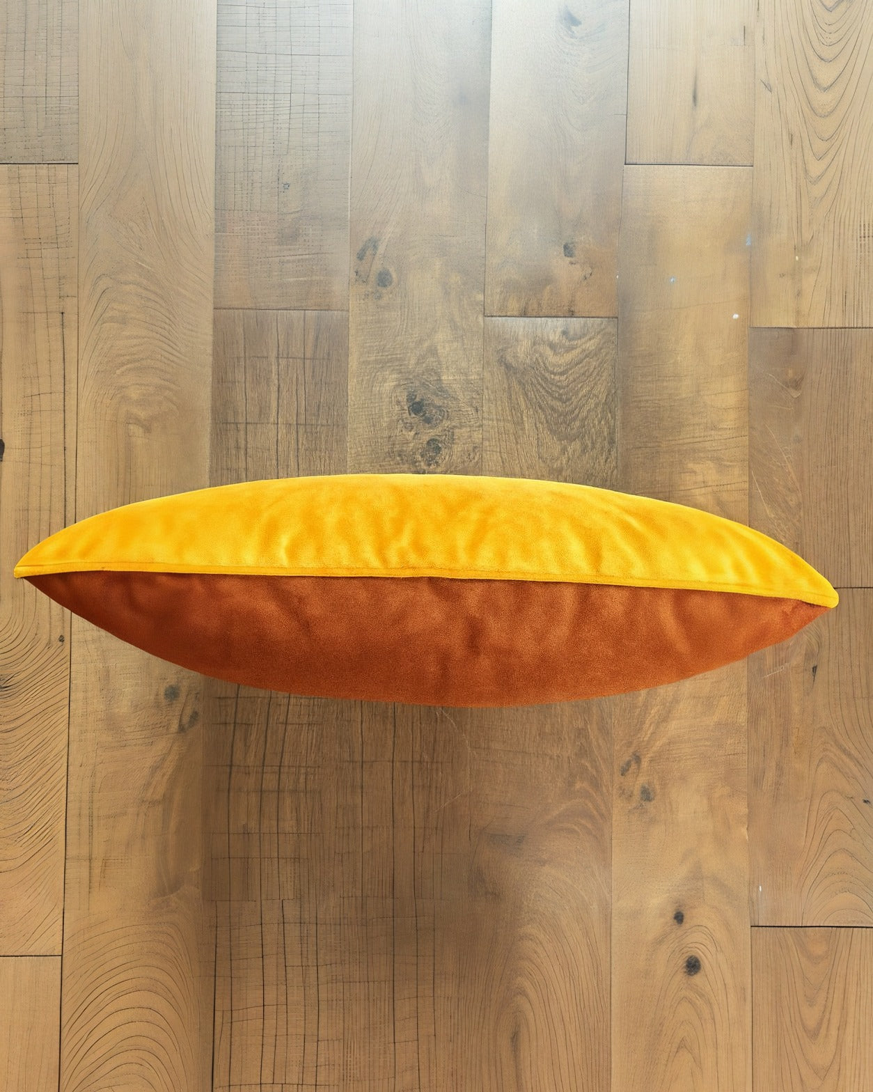 Velvety_Pillow_on_Warm_Wooden_Floor.jpg Velvety Pillow on Warm Wooden Floor